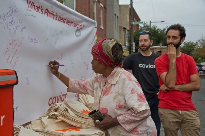 Philadelphians share their Philly secrets at the Point Breeze Night Market. (Kimberly Paynter/WHYY)