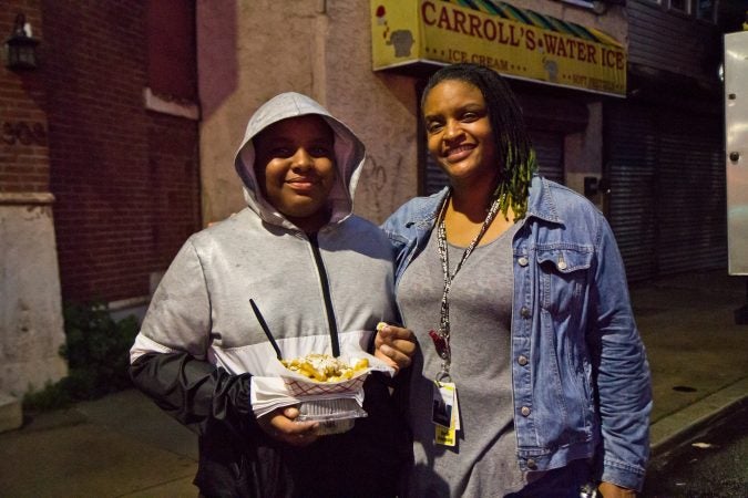 Renee Allen and her son William have lived in Point Breeze for 12 years. (Kimberly Paynter/WHYY)