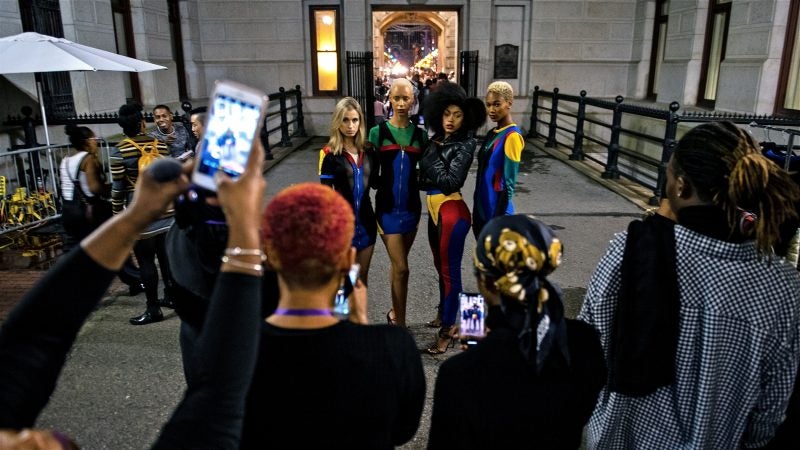 Models stand for a group photo backstage at Philadelphia Fashion Week, held at Dilworth Park. (Kriston Jae Bethel for WHYY)