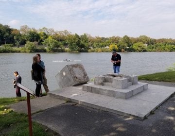 Police are investigating after the statue of a Viking  was toppled from its base along Philadelphia's Boathouse Row. (Tom MacDonald/WHYY)