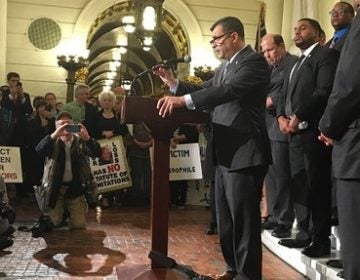 Rep. Mark Rozzi, (D-Berks) speaks at a rally in favor of the a two-year window for retroactive lawsuits on statute-limited cases. (Katie Meyer/WITF)