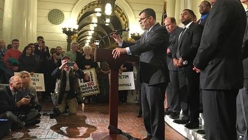 Rep. Mark Rozzi, (D-Berks) speaks at a rally in favor of the a two-year window for retroactive lawsuits on statute-limited cases. (Katie Meyer/WITF)