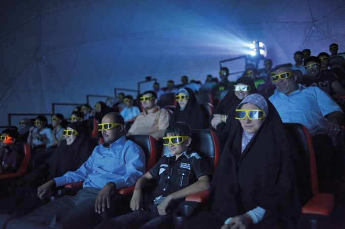 Iraqis watch a 3-D movie in Baghdad, February 2010.