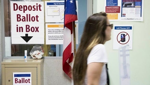 Pennsylvania doesn't allow early voting — but it does let voters send in absentee ballots as long as they have a good reason for needing one. (John Minchillo/AP Photo)