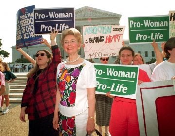 Anti-abortion demonstrators, including Phyllis Schlafly, foreground, rally at the U.S. Supreme Court in Washington, D.C., on June 29, 1992. The high court upheld most provisions of a restrictive Pennsylvania abortion law.