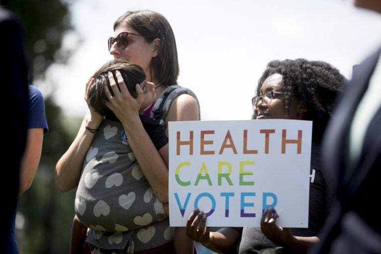 Families affected by pre-existing conditions attend a news conference on Capitol Hill in Washington, Tuesday, June 26, 2018. (Andrew Harnik/AP Photo)