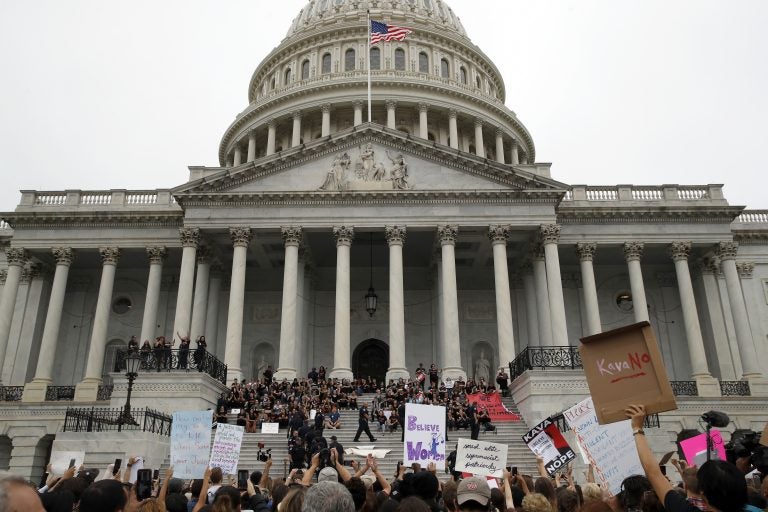 Activists are arrested by Capitol Hill Police officers after occupying the steps on the East Front of the U.S. Capitol as they protest the confirmation vote of Supreme Court nominee Brett Kavanaugh on Capitol Hill, Saturday, Oct. 6, 2018 in Washington. (Alex Brandon/AP Photo)