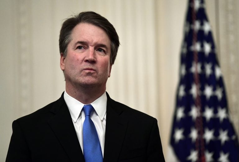 Supreme Court Justice Brett Kavanaugh stands before a ceremonial swearing-in in the East Room of the White House in Washington, Monday, Oct. 8, 2018. (Susan Walsh/AP Photo)