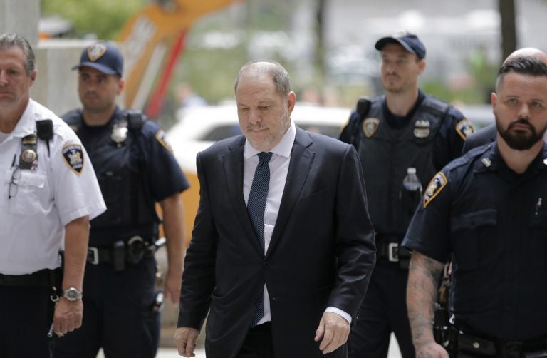 Harvey Weinstein, (center), arrives to court in New York, Thursday, Oct. 11, 2018.  Weinstein is set to appear before a judge as his lawyers try to get the charges dismissed in his criminal case. (Seth Wenig/AP Photo)