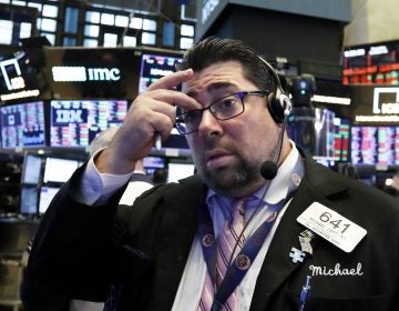 Trader Michael Capolino works on the floor of the New York Stock Exchange, Thursday, Oct. 11, 2018. The market's recent decline was set off by a sharp drop in bond prices and a corresponding increase in yields last week and early this week. (Richard Drew/AP Photo)