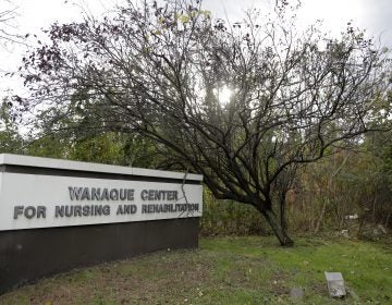 A general look of the marquee outside of the Wanaque Center For Nursing And Rehabilitation, where New Jersey state Health Department confirmed the 18 cases of adenovirus, Tuesday, Oct. 23, 2018, in Haskell, N.J.  (AP Photo/Julio Cortez)