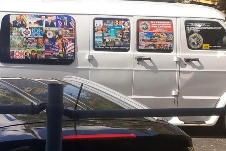 This Nov. 1, 2017, photo shows a van with windows covered with an assortment of stickers in Well, Fla. Federal authorities took Cesar Sayoc into custody on Friday, Oct. 26, 2018, and confiscated his van, which appears to be the same one, at an auto parts store in Plantation, Fla., in connection with the mail-bomb scare that has targeted prominent Democrats from coast to coast. (Courtesy of Lesley Abravanel via AP)