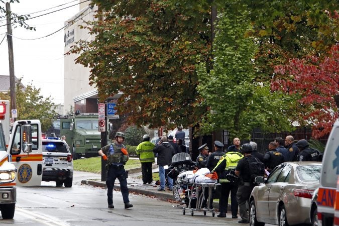 First responders surround the Tree of Life Synagogue where a shooter opened fire Saturday, Oct. 27, 2018. (Gene J. Puskar/AP Photo)