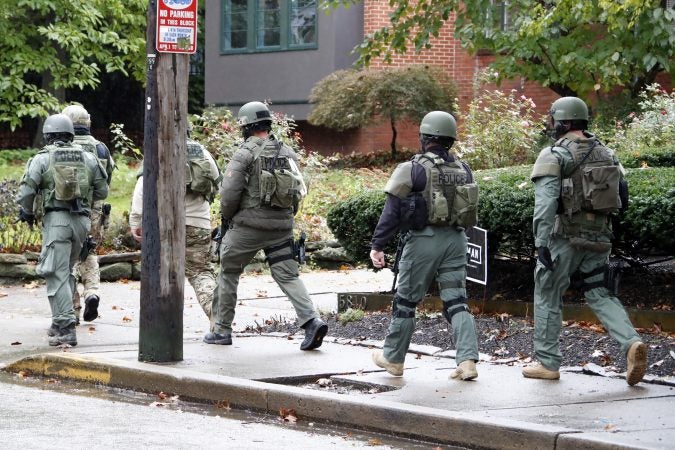 A SWAT team arrives at the Tree of Life Synagogue where a shooter opened fire injuring multiple people, Saturday, Oct. 27, 2018. (Gene J. Puskar/AP Photo)