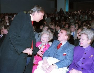 Donald Trump, left, talks with his parents, Mary and Fred and his sister, U.S. District Court Judge Maryanne Trump Barry, at the opening of Trump's Taj Mahal Casino Resort in Atlantic City, N.J., Thurs., April 5, 1990. (AP Photo)