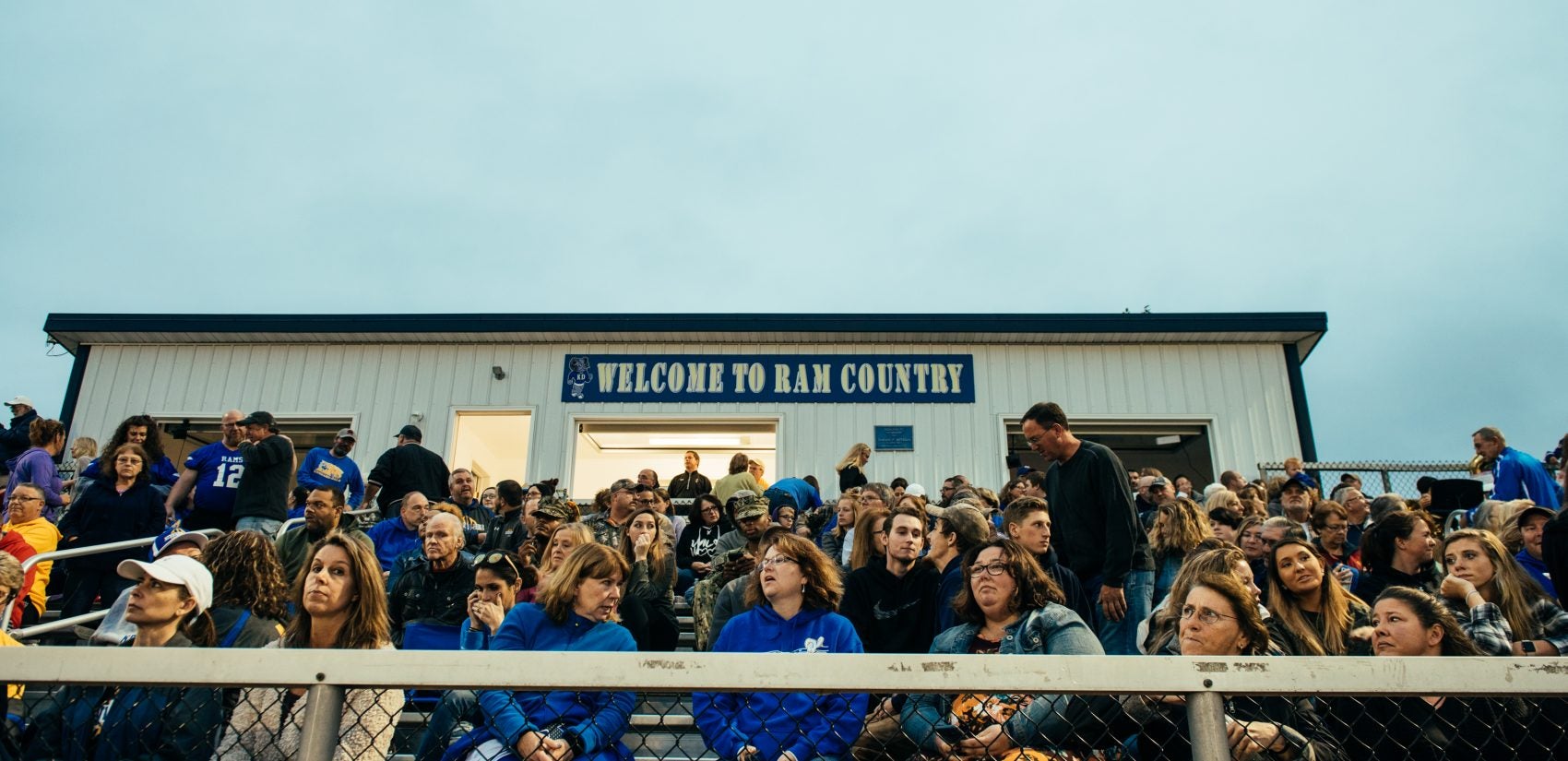 Parents waiting for the Kennard-Dale homecoming football game to start. (Dani Fresh for WHYY)