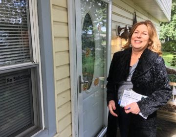 State Rep. Tina Davis, a Democrat, knocks on doors in Bucks County in her attempt to win Pennsylvania's 6th Senatorial District. (Jim Saksa/Keystone Crossroads)