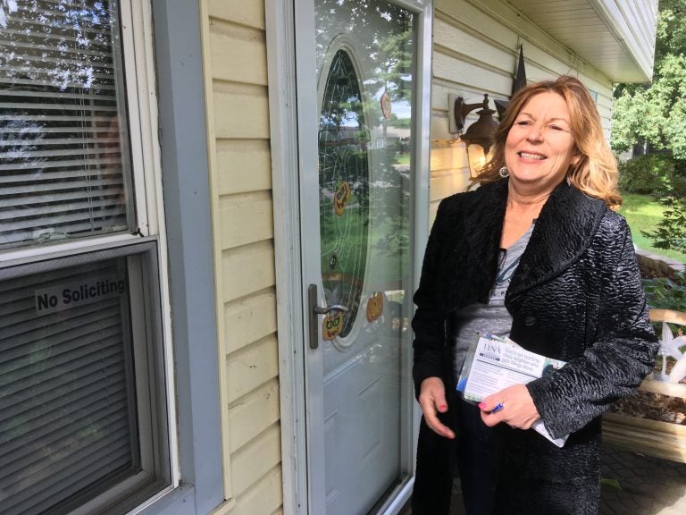 State Rep. Tina Davis, a Democrat, knocks on doors in Bucks County in her attempt to win Pennsylvania's 6th Senatorial District. (Jim Saksa/Keystone Crossroads)