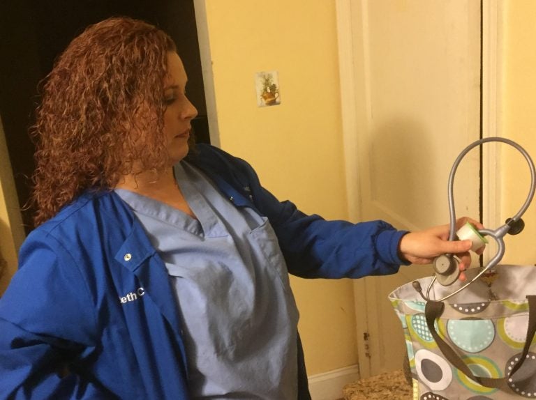 Beth Carroll, of New Castle, Del., has been a registered nurse for 16 years. Today she works at a surgery center with regular hours. But that was not always the case. At other healthcare facilities, she frequently had to work overtime and overnight shifts. She’s says that’s because of a national shortage of nurses. (Zoe Read/WHYY)