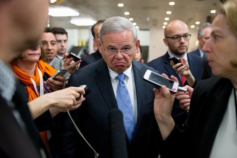 Sen. Bob Menendez, D-N.J., speaks with reporters on Capitol Hill in Washington, Tuesday, April 14, 2015. Menendez took a business-as-usual approach Monday when he returned to Congress for the first time since his April 1 indictment on federal corruption charges.