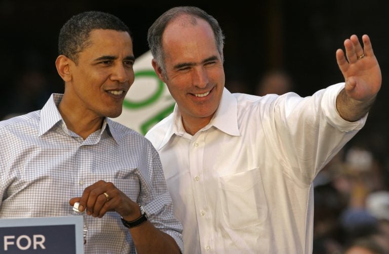 Democratic presidential hopeful, Sen. Barack Obama, D-Ill., left, looks at the crowd of supporters with Sen. Bob Casey at a rally outside the Lancaster, Pa., train station Saturday, April 19, 2008.