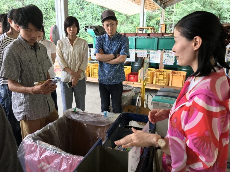 Kamikatsu has become a hub for workshops on recycling. Employees from the Osaka branch of the Patagonia clothing store traveled here to learn waste reduction techniques. (Sonia Narang for WHYY)