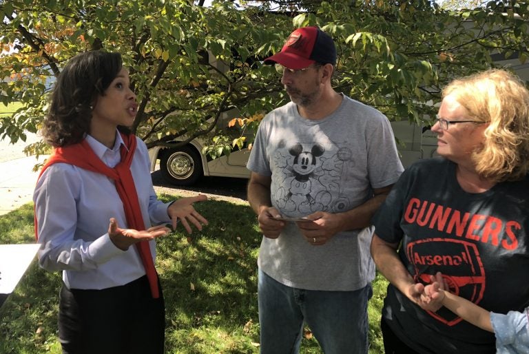 U.S. Rep. Lisa Blunt Rochester campaigns in Hockessin at the home of Cliff and Ann Dempsey. The Democrat is seeking her second two-year term. (Cris Barrish/WHYY)