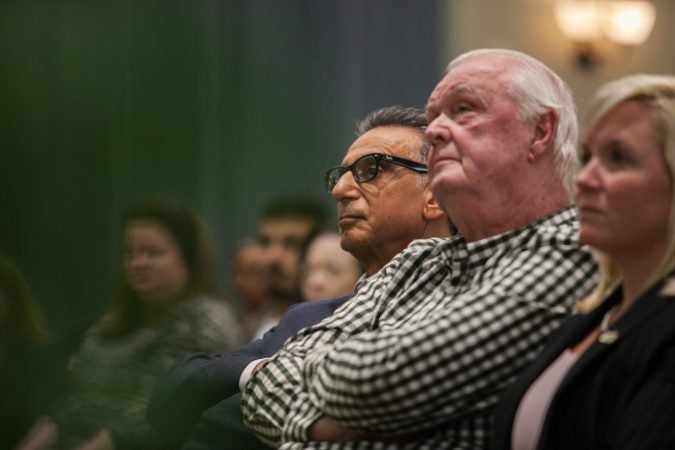 Glassboro, NJ - OCTOBER 18, 2018: Ali A. Houshmand, Rowan University president listen to former New Jersey Governor Chris Christie speak about the future of the Republican Party at an event at Rowan University. (Miguel Martinez for WHYY)