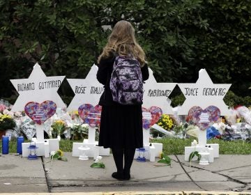 Stars of David with the names of those killed in a deadly shooting at the Tree of Life Synagogue, stand in front of the synagogue in Pittsburgh, Monday, Oct. 29, 2018.