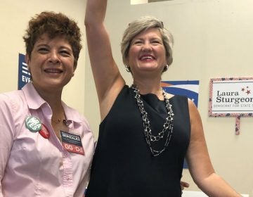 Guillermina Gonzalez (left) and Laura Sturgeon are running for the Delaware House and Senate, respectively. Both candidates participated in a September gun control rally in Hockessin. (Cris Barrish/WHYY)