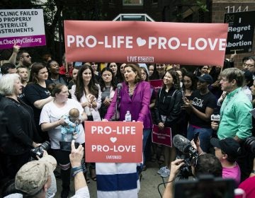 Ashley Garecht speaks as anti-abortion protesters rally near a Planned Parenthood clinic in Philadelphia, Friday, May 10, 2019. The demonstration was spurred by the actions of a Democratic state lawmaker who recorded himself berating an anti-abortion demonstrator at length outside the clinic. (Matt Rourke/AP Photo)