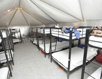 Just outside the tiny town of Tornillo, Texas, is a temporary shelter for migrant children. It opened in June and last month the federal government announced it was expanding the shelter's capacity to 3,800 beds — making it the largest shelter in the system for kids who cross the border alone. (U.S. Department of Health and Human Services via AP) 