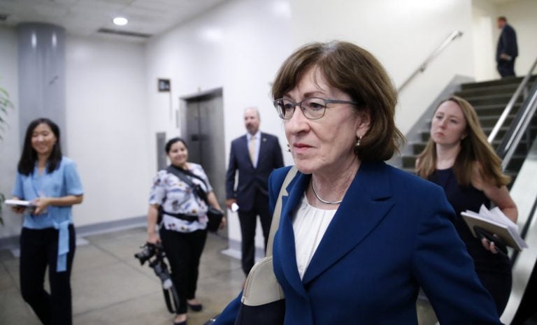 Sen. Susan Collins, R-Maine, walks on Capitol Hill on Wednesday. A key vote on Brett Kavanaugh's Supreme Court nomination, she said Thursday that the FBI investigation seemed 