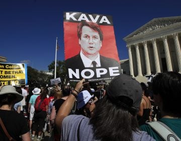Demonstrators gather Thursday outside the Supreme Court, demanding that the Senate reject Judge Brett Kavanaugh’s nomination.