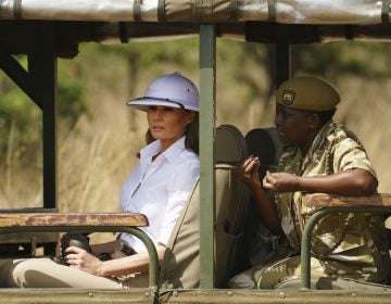 First lady Melania Trump looks out over Nairobi National Park in Nairobi, Kenya. Critics say the pith helmet she's wearing is a symbol of colonialist attitudes. (Carolyn Kaster/AP)