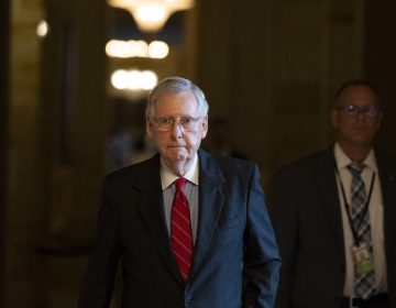 Senate Majority Leader Mitch McConnell of Kentucky walks to the Senate floor for a vote on Thursday. (Alex Brandon/AP)