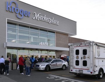 The scene outside a Kroger supermarket following a shooting that left two people dead last Wednesday in Jeffersontown, Ky. Many have labeled the attack a hate crime. (Timothy D. Easley/AP)
