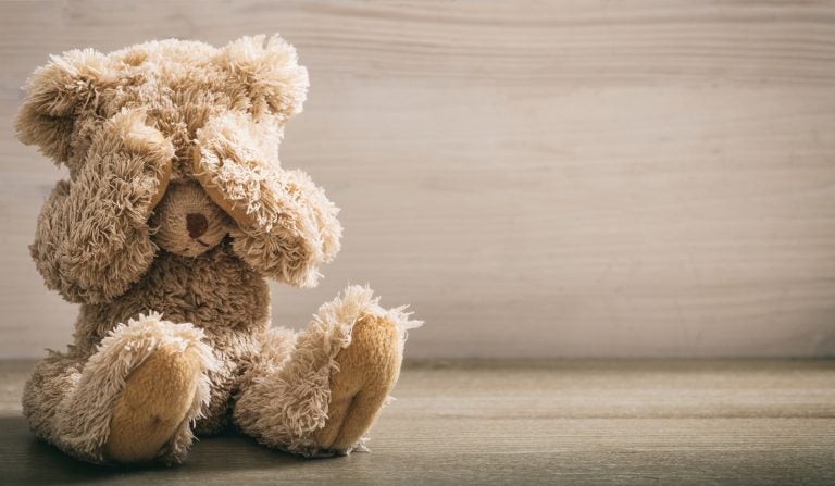 Teddy bear covering eyes. (Photo Courtesy/BigStock)