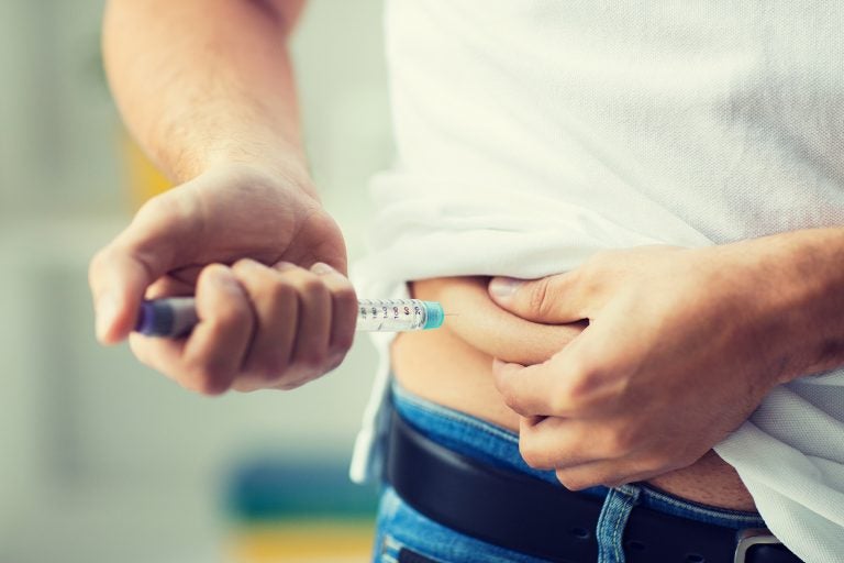 A man injects insulin as part of his treatment for diabetes. (Bigstock)