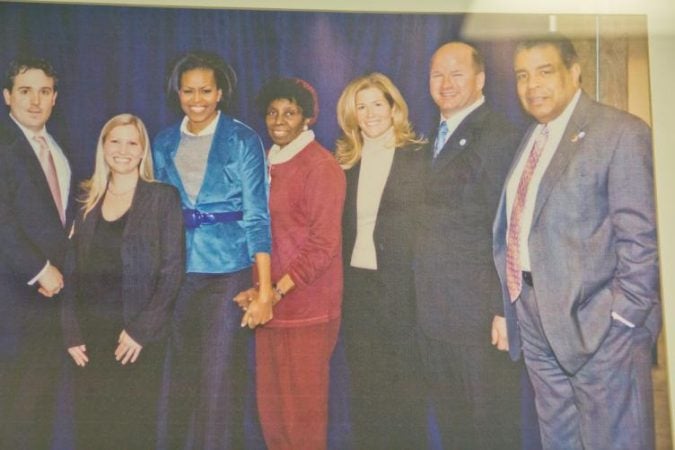 Board Chairman Emeritus Wendell Whitlock (far right) with others and Former First Lady Michelle Obama when she visited Sullivan Progress Plaza (Kimberly Paynter/WHYY)