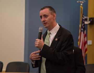 US Rep. Brian Fitzpatrick of Pennsylvania's 8th district talks to a crowd of constituents during a town hall in Bensalem, PA August 22nd 2017. (Emily Cohen for NewsWorks)