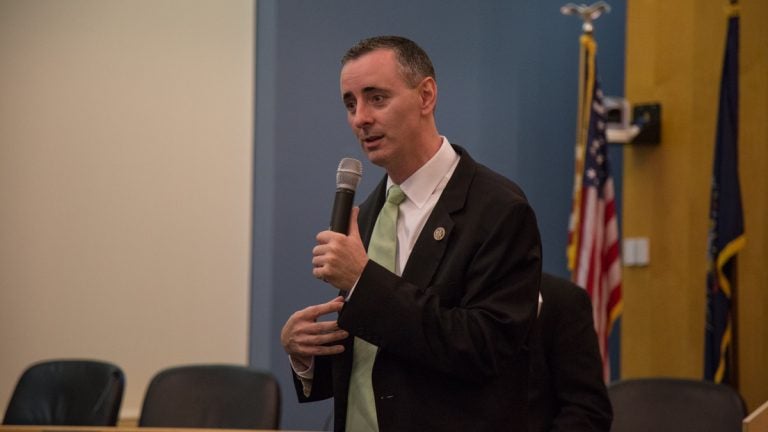 US Rep. Brian Fitzpatrick of Pennsylvania's 8th district talks to a crowd of constituents during a town hall in Bensalem, PA August 22nd 2017. (Emily Cohen for NewsWorks)