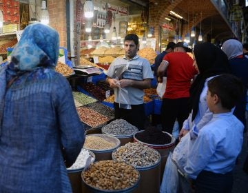 The unanimous ruling from the International Court of Justice orders the U.S. to allow Iran to import food, medical supplies and other products for humanitarian reasons. Here, people browse for goods in the Grand Bazaar in Tehran.
(Fatemeh Bahrami/Anadolu Agency/Getty Images)