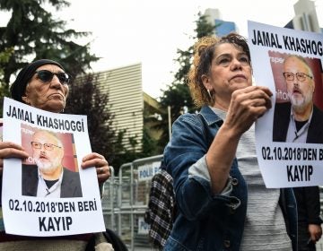 Protestors hold portraits of missing journalist Jamal Khashoggi outside Saudi Arabia's consulate in Istanbul on Tuesday. Khoshoggi disappeared upon visiting the consulate last week. (Bulent Kilic/AFP/Getty Images)