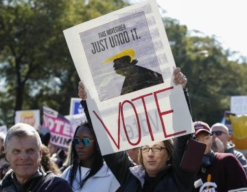 Women gather for a rally and march at Grant Park on Saturday in Chicago to urge voter turnout ahead of the midterm elections. (Kamil Krzaczynski/AFP/Getty Images)