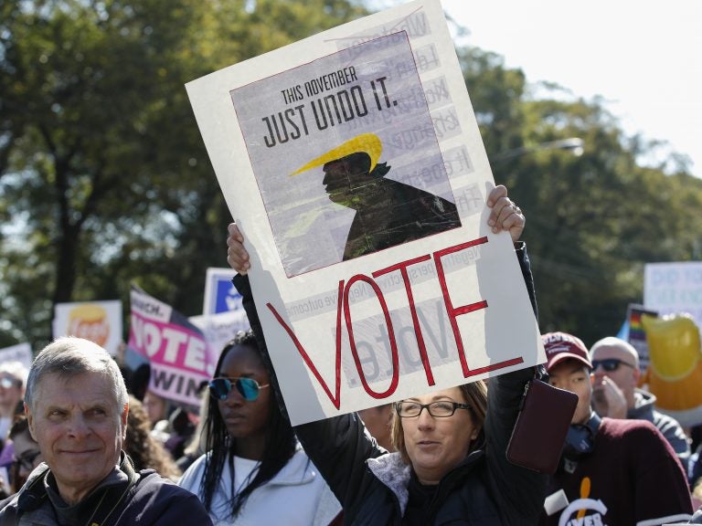 Women gather for a rally and march at Grant Park on Saturday in Chicago to urge voter turnout ahead of the midterm elections. (Kamil Krzaczynski/AFP/Getty Images)
