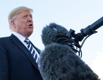 President Trump speaks to reporters before boarding Air Force One in Elko, Nev., Saturday. He said the U.S. would withdraw from a nuclear arms treaty with Russia and accused Russia of violating it. (Nicholas Kamm/AFP/Getty Images)