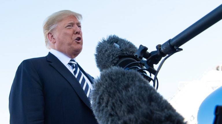 President Trump speaks to reporters before boarding Air Force One in Elko, Nev., Saturday. He said the U.S. would withdraw from a nuclear arms treaty with Russia and accused Russia of violating it. (Nicholas Kamm/AFP/Getty Images)