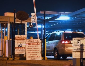 A car enters the United States Postal Service Processing and Distribution Center in Los Angeles on Wednesday.
(Robyn Beck/AFP/Getty Images)