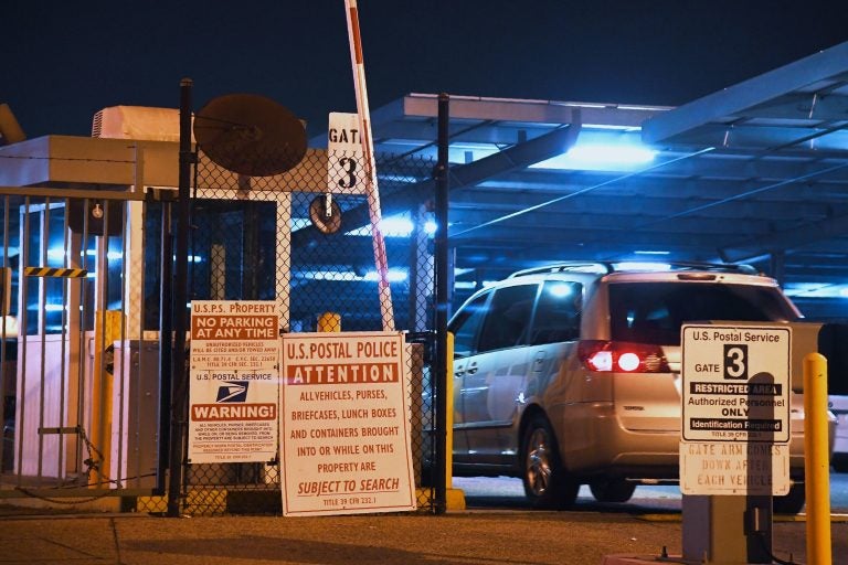 A car enters the United States Postal Service Processing and Distribution Center in Los Angeles on Wednesday. A car enters the United States Postal Service Processing and Distribution Center in Los Angeles on Wednesday.
(Robyn Beck/AFP/Getty Images)